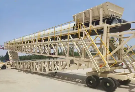 What is the purpose of stacking conveyor?